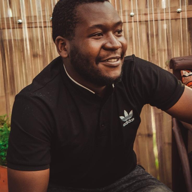 Kaveri Mehta, Lead Design Curator at Distributed Resource Hub, reviewing corporate floral arrangements